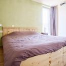 Duurzaam overnachten met opgemaakte bedden in biologisch katoensatijn