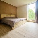 Slaapkamer voor 2 personen. Elke kamer heeft een privé-badkamer