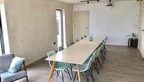 Tweede leefruimte / eetzaal / polyvalente zaal vakantiewoning